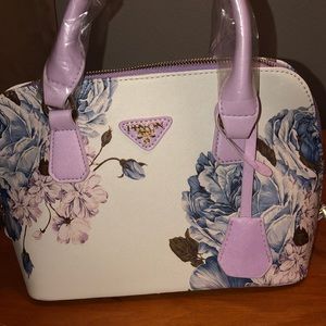 A white and purple purse